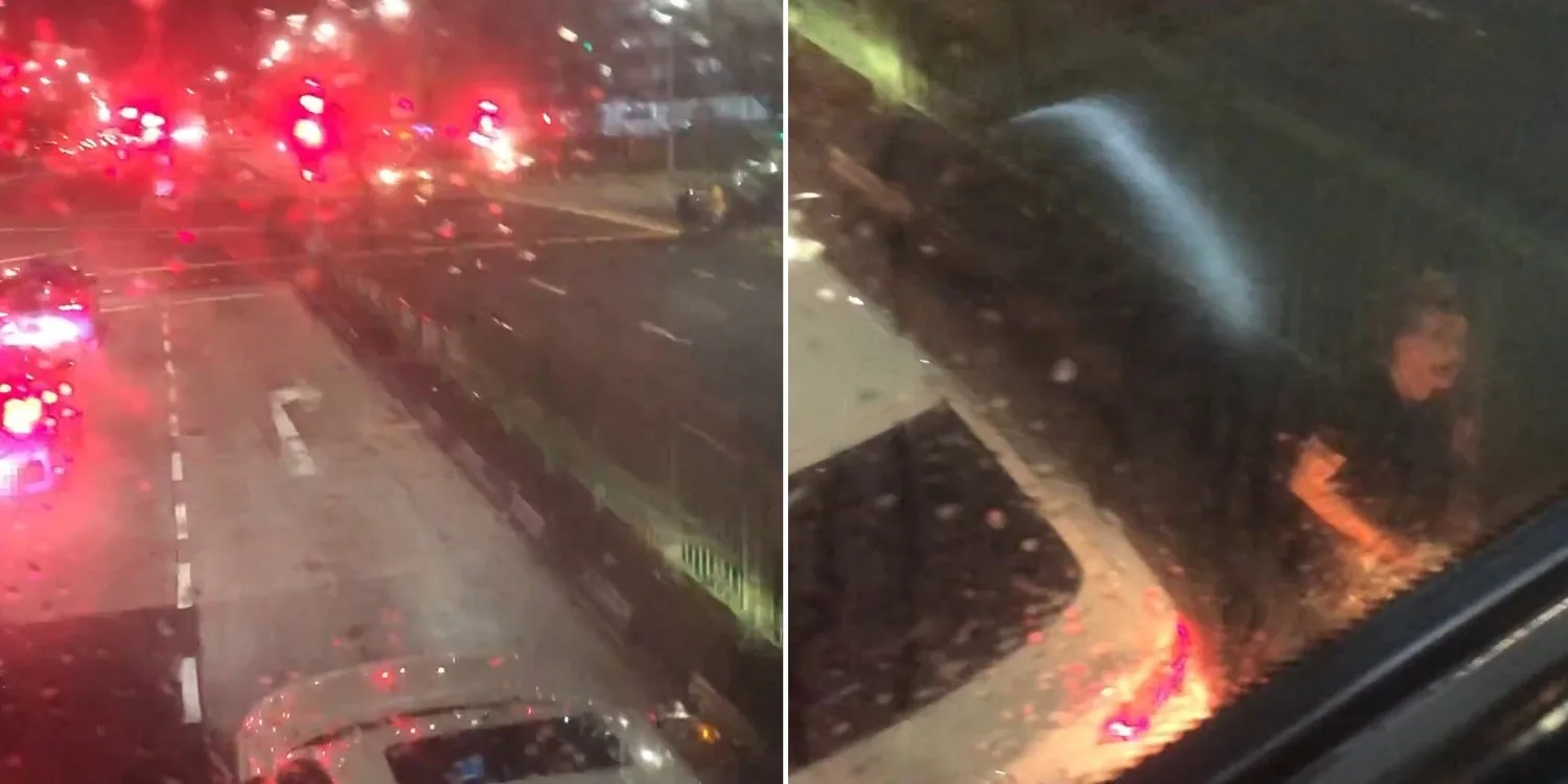 Un conducteur d’Audi bloque le bus au carrefour de Hougang, en sort et heurte le pare-brise du bus